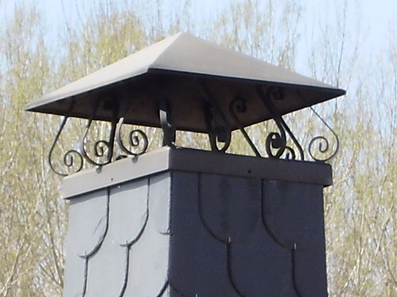 Capota de chimenea en pizarra y forja.